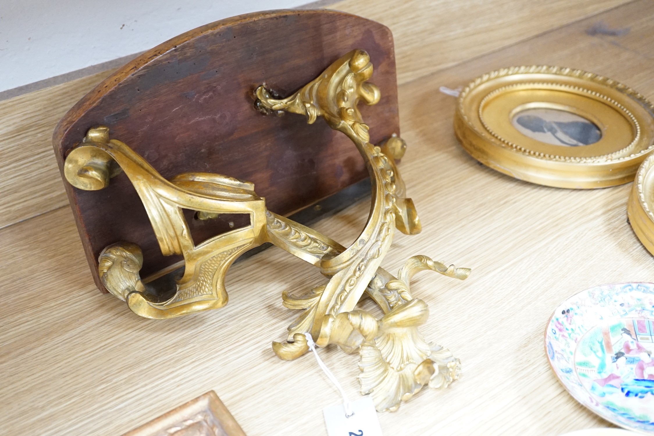 A French ormolu wall bracket, later mahogany top. 29x33cm